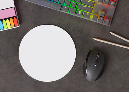 Blank and white, round computer mouse pad on the desk at home. Mousepad mockup. Copy space for your picture or text. Empty mouse mat ready for your design. Mock up, template. 3D render.の写真素材
