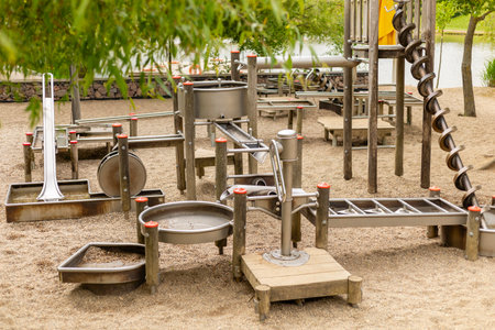 This engaging water play structure features various channels, slides, and water features designed for childrens interactive playの写真素材