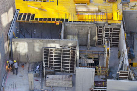 construction site and building activities with building labourの写真素材