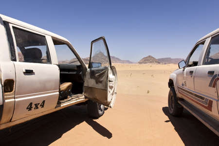 Trip with some damn old off-road vehicle through the desert の写真素材