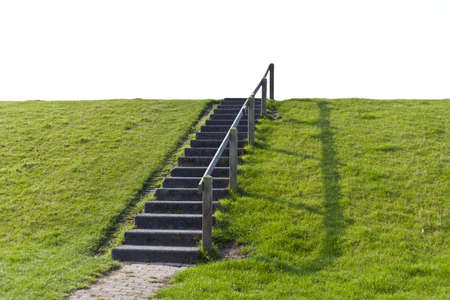 A simple staircase direct the way forward on a small hill into the white Nothing, which could be...