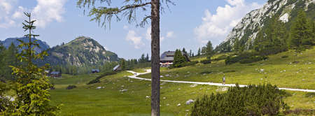 Mother Nature - Landscape of the Tauplitz-Alm  alpine pasture  in Austria with some non recognizable people hiking in the back の写真素材