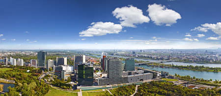 Very clear and detailed panorama of the amazing Skyline of Donau City Vienna with the famous UNO City at the left the Danube at the right and the Donaupark in front The image was made out of several high resolution vertical shots meticulously merged into Very clear and detailed panorama of the amazing Skyline of Donau City Vienna with the famous UNO City at the left the Danube at the right and the Donaupark in front The image was made out of several high resolution vertical shots meticulously merged into