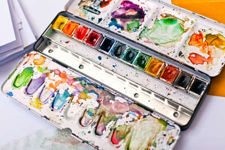 Picture of messy, used aquarelle paintboxの写真素材