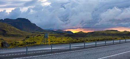 Road beside surreal landscape with wooly moss of Iceland.の写真素材