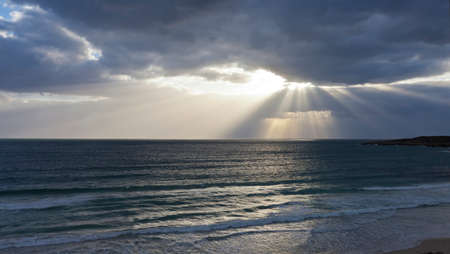 Moody Sky above the wide great seaの写真素材