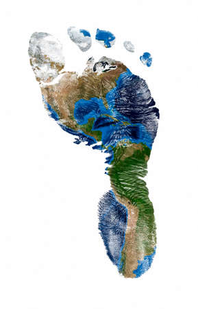 Real imprint of child foot with a world map of north and south america - isolated on white...