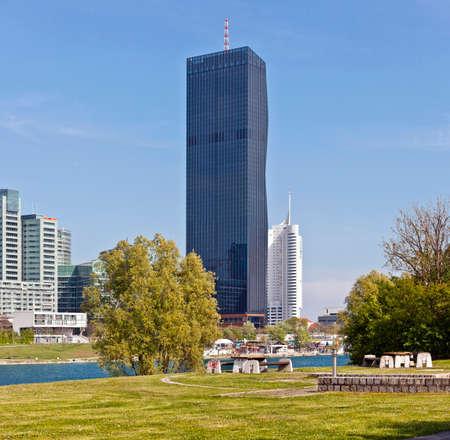 Vienna at the Danube Island - one of the most interesting extensive public recreation area with the new DC-Tower - the tallest skyscraper in Austria.のeditorial素材