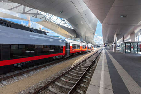 VIENNA, AUSTRIA - SEPTEM 8, 2015: The new Main Railway Station of Vienna with the new OEBB Train Cityjet.のeditorial素材