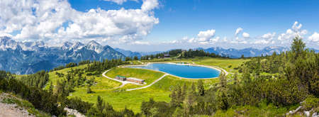 View from the mountain top called Hoess at the Austrian Alps. The Hoes is part of the Village Hinterstoder in Upper Austria and especially known for his famous world cup ski races in winter.の写真素材