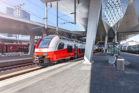 VIENNA, AUSTRIA - SEPTEM 8, 2015: The new Main Railway Station of Vienna with the new OEBB Train Cityjet.のeditorial素材