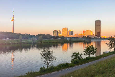 The so called Danube Island in Vienna with the amazing skyline of Danube City at the Danube River - Austria. It's one of the most interesting extensive public recreation area in Viennaの写真素材