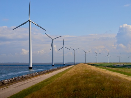 Windfarm along the coast seen from the top of a dikeの写真素材