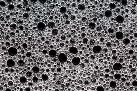 Background of Soap Bubbles on Water Level