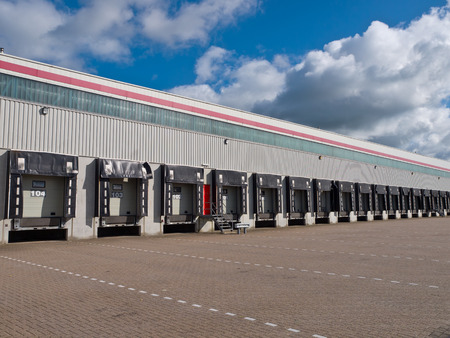 Empty Loading Dock Cargo Door as a Symbol for Economic Growthのeditorial素材