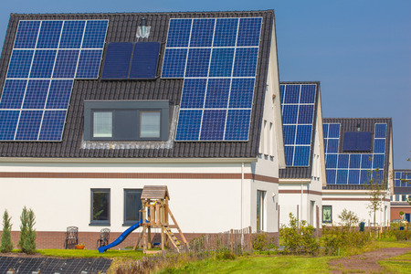 Solar Panels installed on Newly Constructed Houses in a Suburban Area