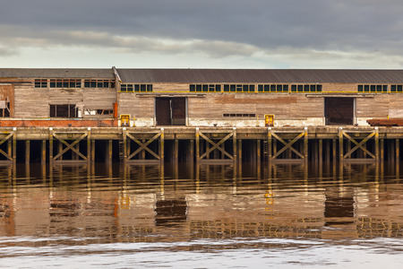 Old Wooden Harbor Buildings in Delfzijlのeditorial素材