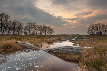 Fish passes are increasingly used to restore fish migration routes, often necessary for reproductionの写真素材