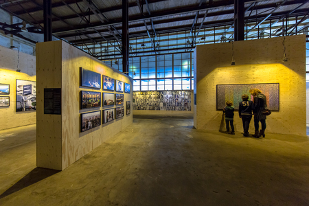 GRONINGEN, THE NETHERLANDS - SEP 27, 2015: Visitors at Photo exhibition Noorderlicht Data Rush in oude suikerfabriek Groningen.のeditorial素材
