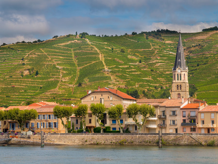 Tournon sur Rhone river town and Vineyards on the Hills of the Cote du Rhone Area in Franceの写真素材