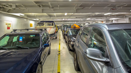 Passenger cars in interior of marine ferry in Europe