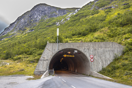 Tunnel road entrance through mountainの写真素材