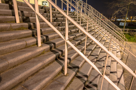 Wide stairs for thousands of spectator audiance at a football stadiumの写真素材