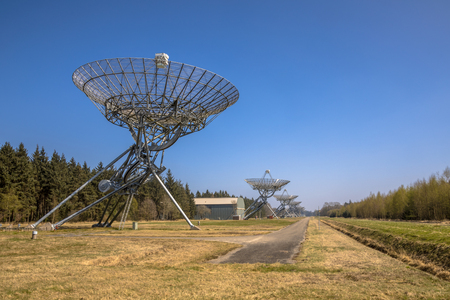 Long row of radio telescopes in westerbork in the Netherlandsのeditorial素材