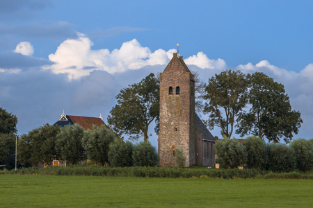 Church with tower in hamlet of Feytebuorren on frisian countryside near Blauwhuis. Friesland, Netherlandsの写真素材