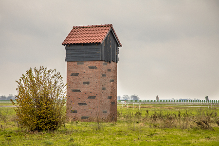EEMSHAVEN,NETHERLANDS - NOVEMBER 22, 2017: Bat house tower for protection and housing of pipistrelle bats in the Netherlandsのeditorial素材