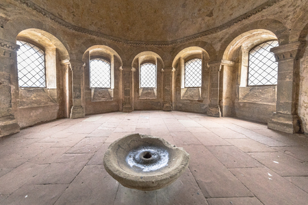 TRIER, GERMANY - FEBRUARY 21, 2017: Interior with water well of Porta Nigra historic roman portal built in the second century in German city of Trierのeditorial素材