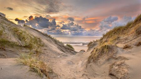 Sunset View on North Sea and Canal fom dunes in Zeeland, Netherlands
