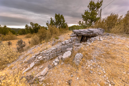 Prehistoric Dolmen in highland limestone karst landscape of Causse de Blandas in the Cevennes, Franceの写真素材