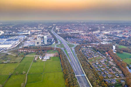 Aerial view of Highway through city of Zwolle at sunset. Overijssel Province, the Netherlands.の写真素材