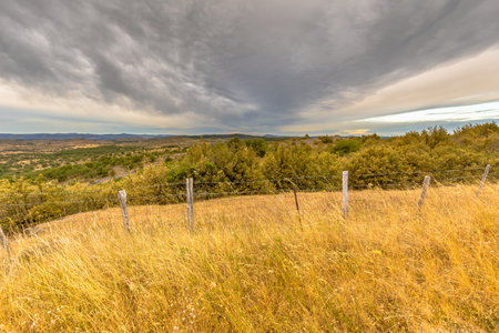 Sunrise over highland limestone karst plateau landscape on Causse de Blandas, Occitanie, Franceの写真素材