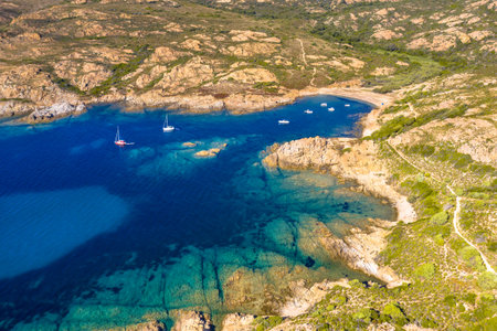 Aerial view of Corsican rocky coast with blue water of Mediterranean sea near Ogliastro, Corsica, Franceの写真素材
