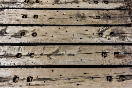 Wooden railway sleepers used as a jetty.の写真素材