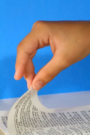 turning the bible page upcloseの写真素材