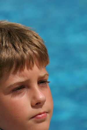young boy concentratingの写真素材