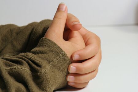 A childs hands togetherの写真素材