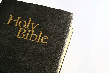 holy bible on white backgroundの写真素材