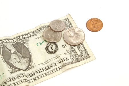 upside down $1 bill & changeの写真素材
