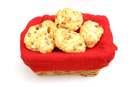 sausage cheese biscuit in basket on topの写真素材