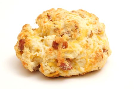 single sausage cheese biscuit on whiteの写真素材