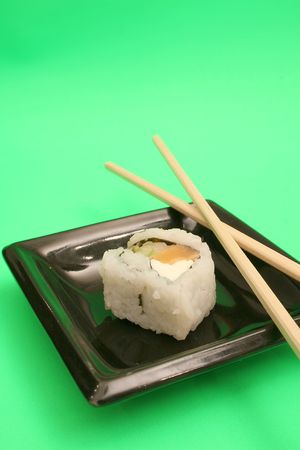 single sushi on green verticalの写真素材