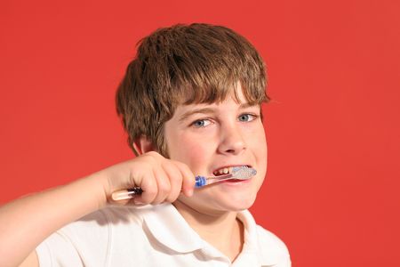 boy brushing teethの写真素材