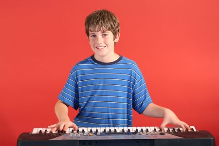 boy on keyboard straightの写真素材