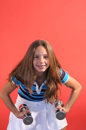 girl curling weights verticalの写真素材
