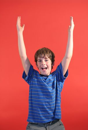 boy with his hands upの写真素材