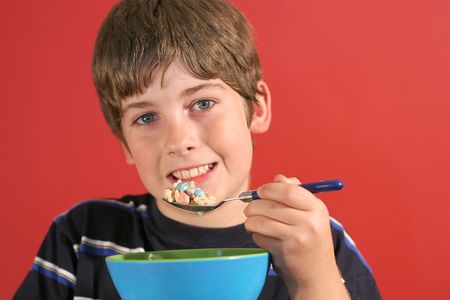 boy eating cerealの写真素材